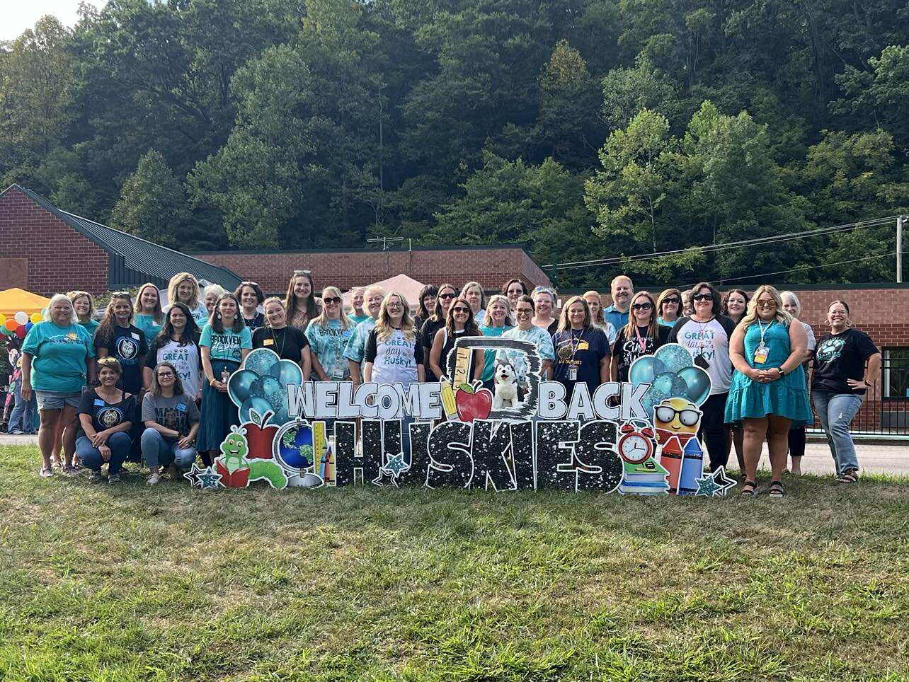 Welcome Back Huskies Staff Photo