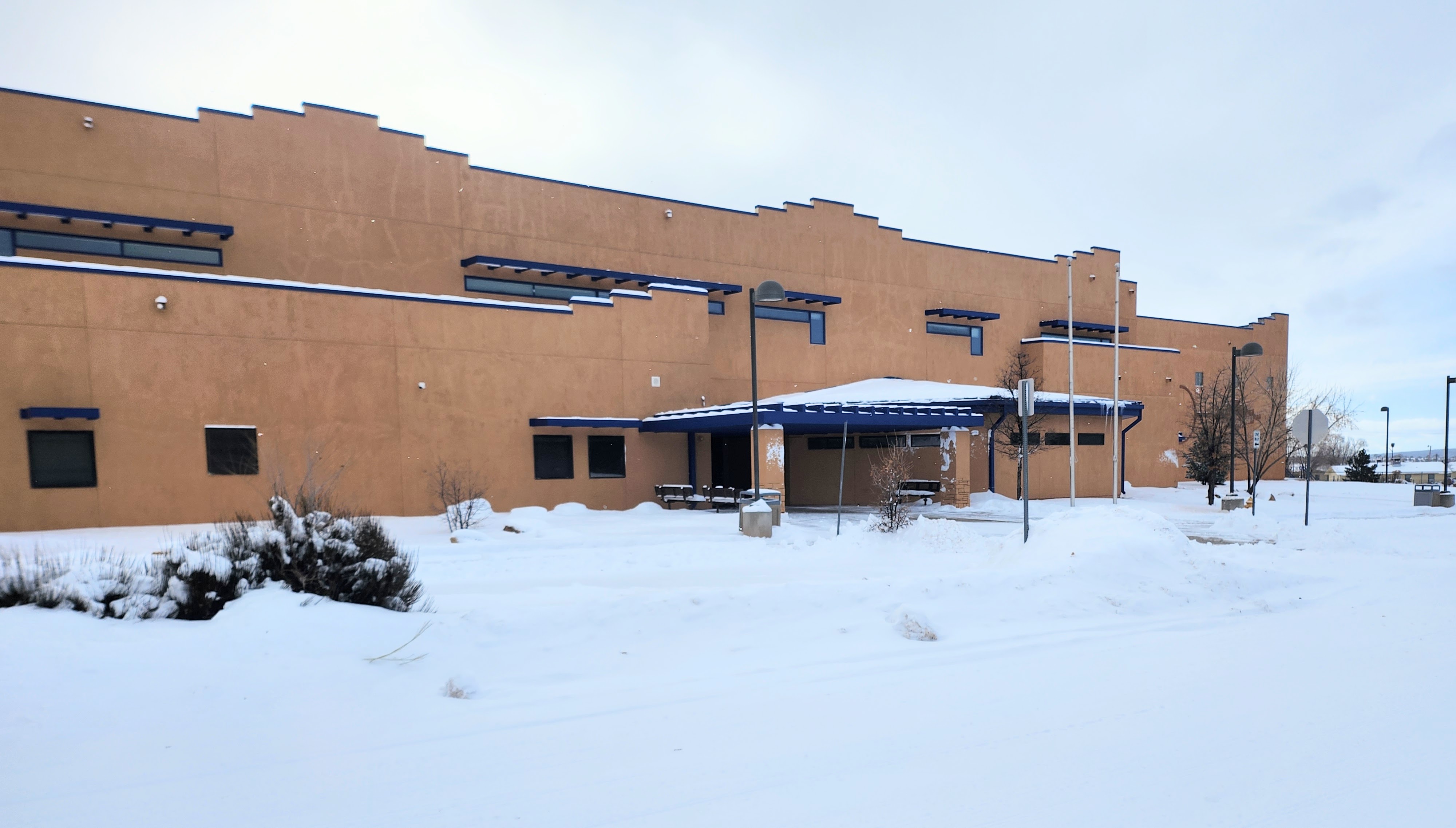 Photo of school building with snow