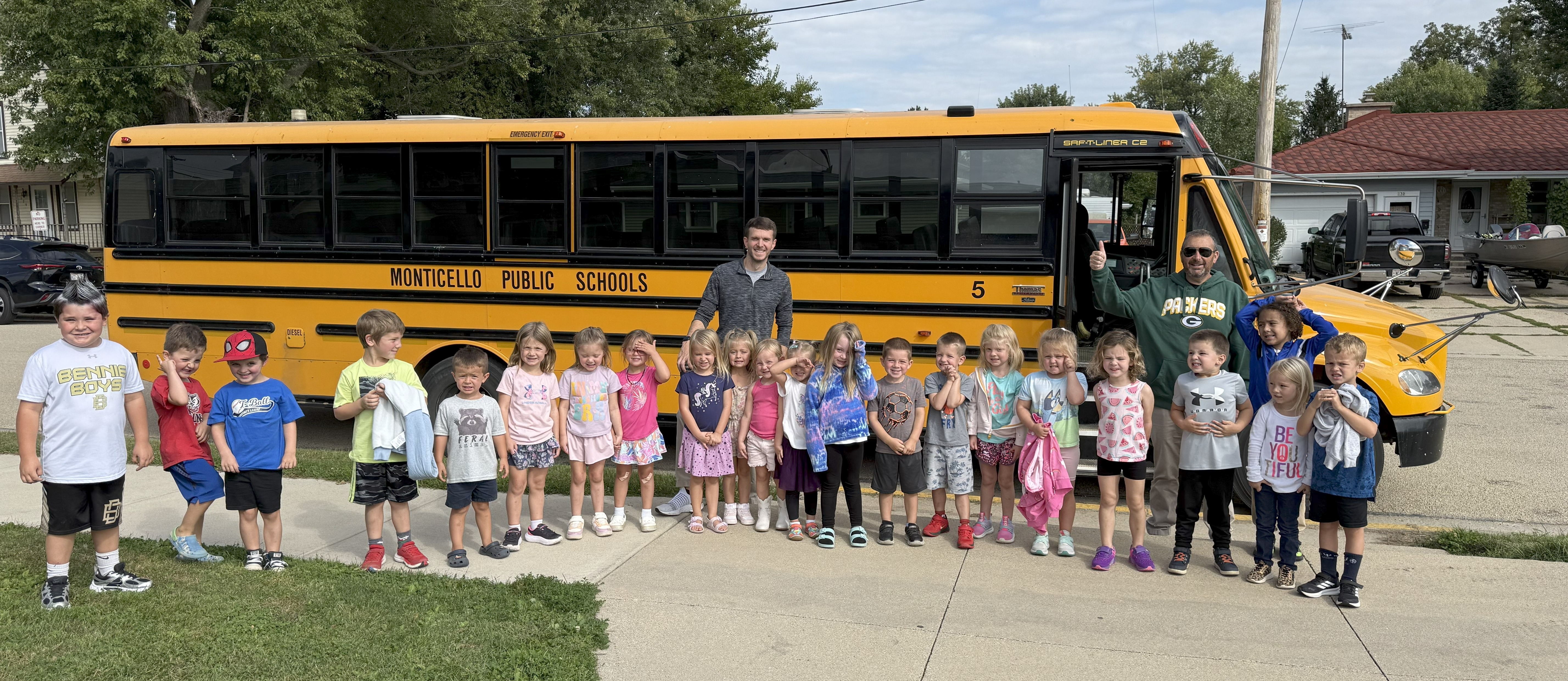 Students, Principal, Superintendent and Bus