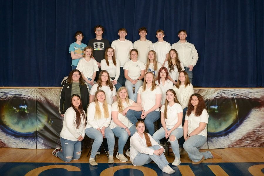 Choir posing in the bleachers