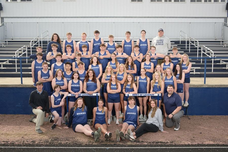 track team posing at gym