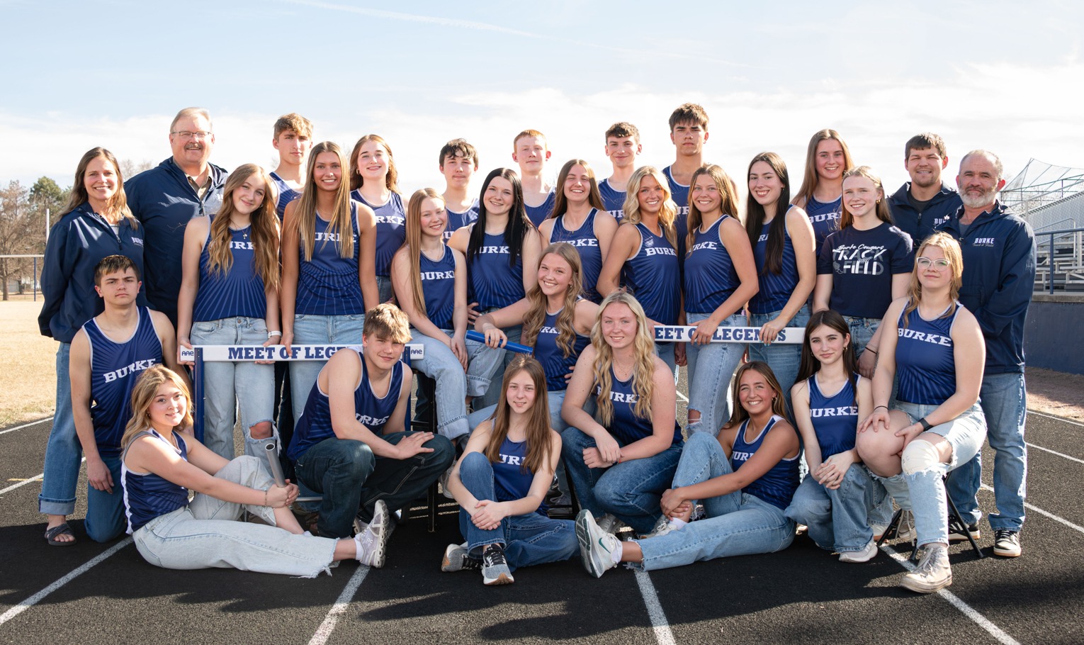 track team posing at gym