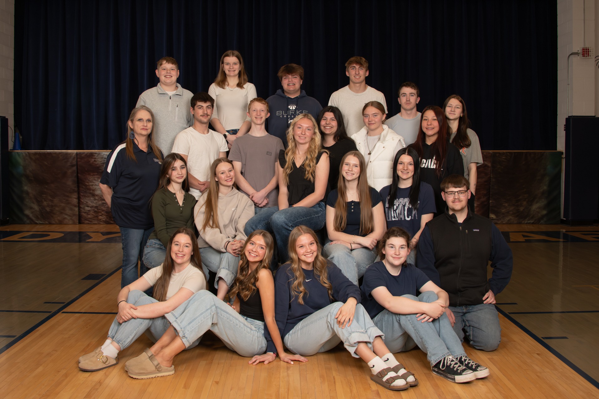 Choir posing in the bleachers