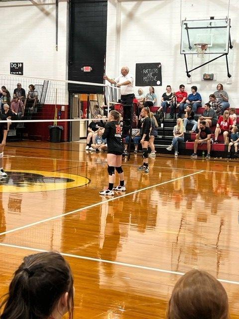 girls playing volleyball