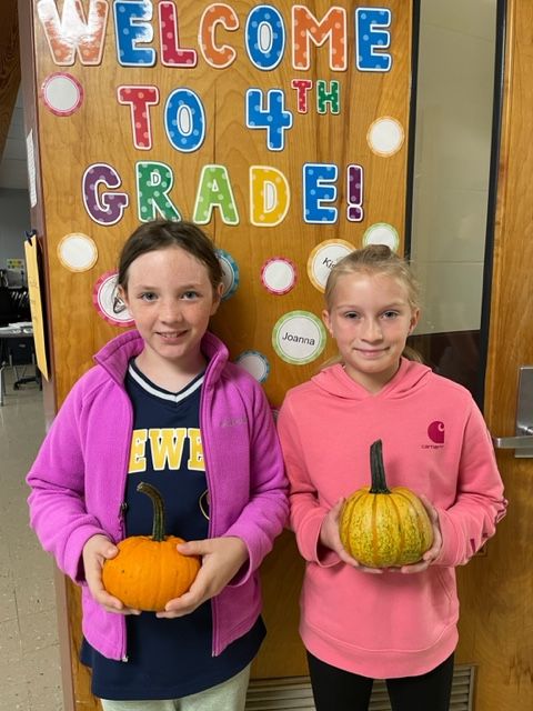 Students with pumpkins