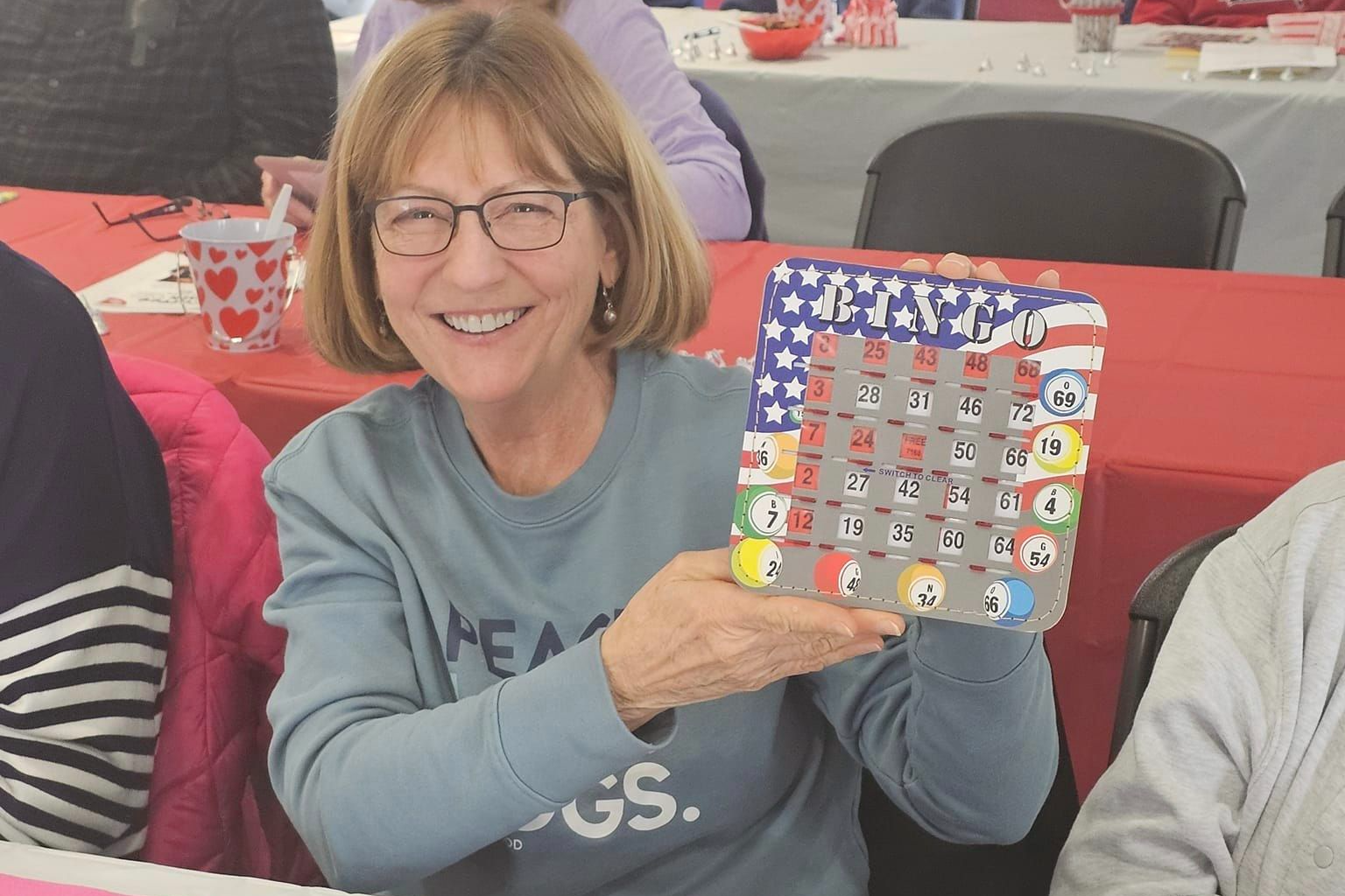 Image of a woman winning bingo