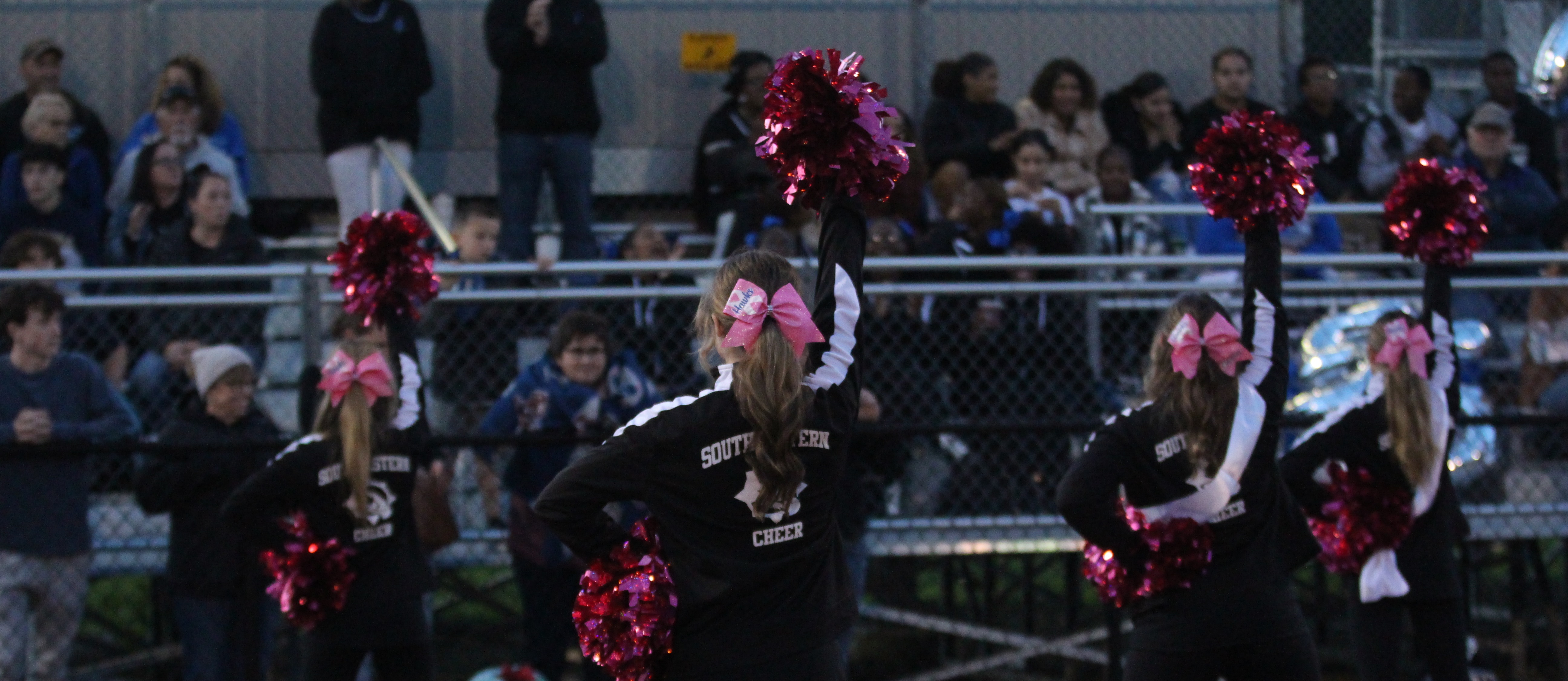 cheerleader cheering to crowd