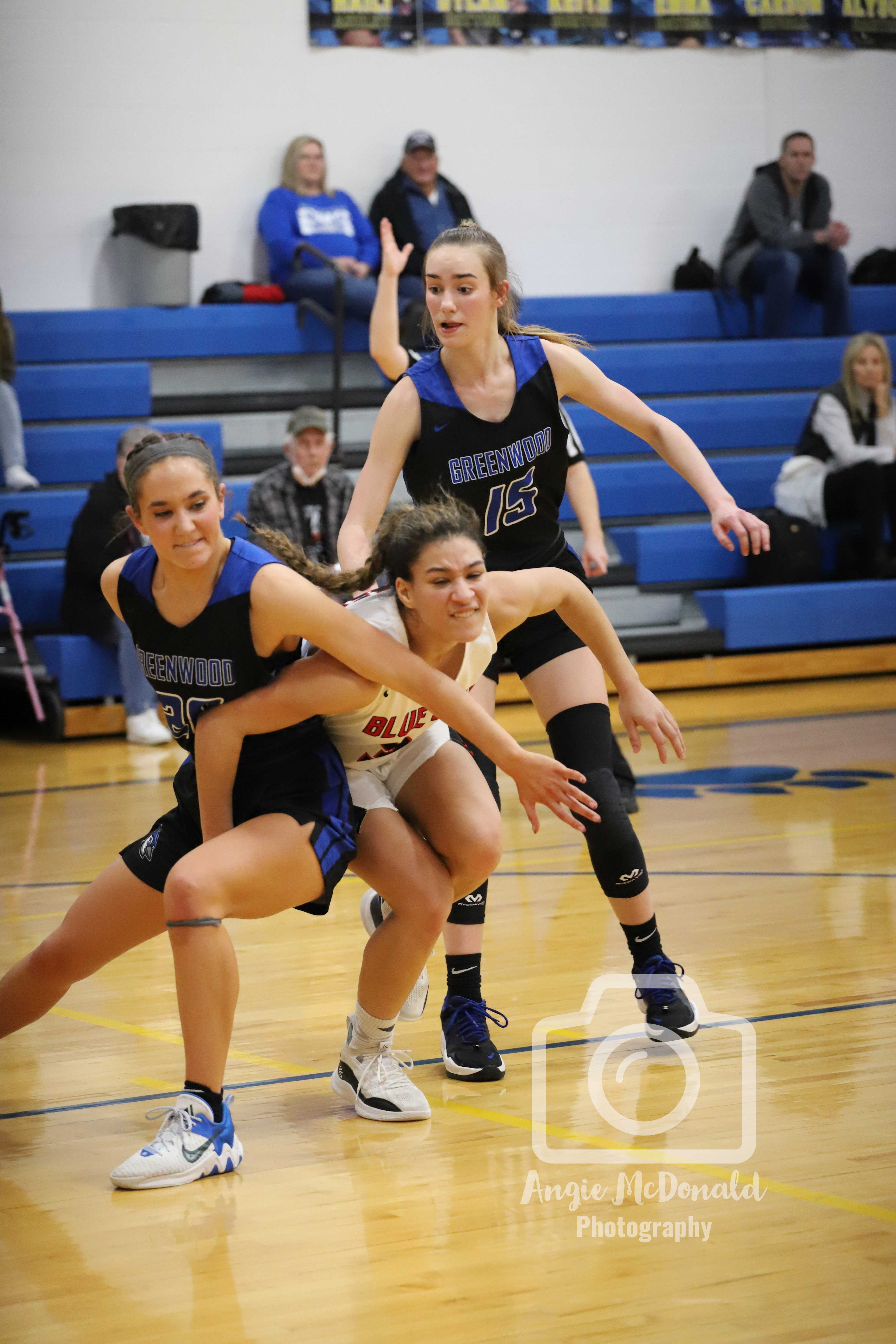 girls playing basketball