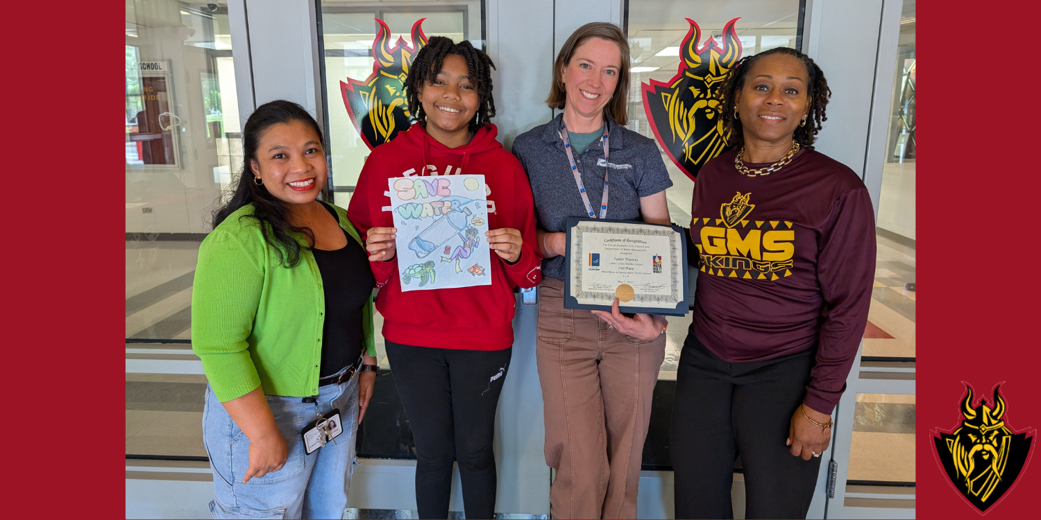 Award presentation with Ms. Joseph, Tyeler Thomas, Erin Boyd, and Dr. Judd