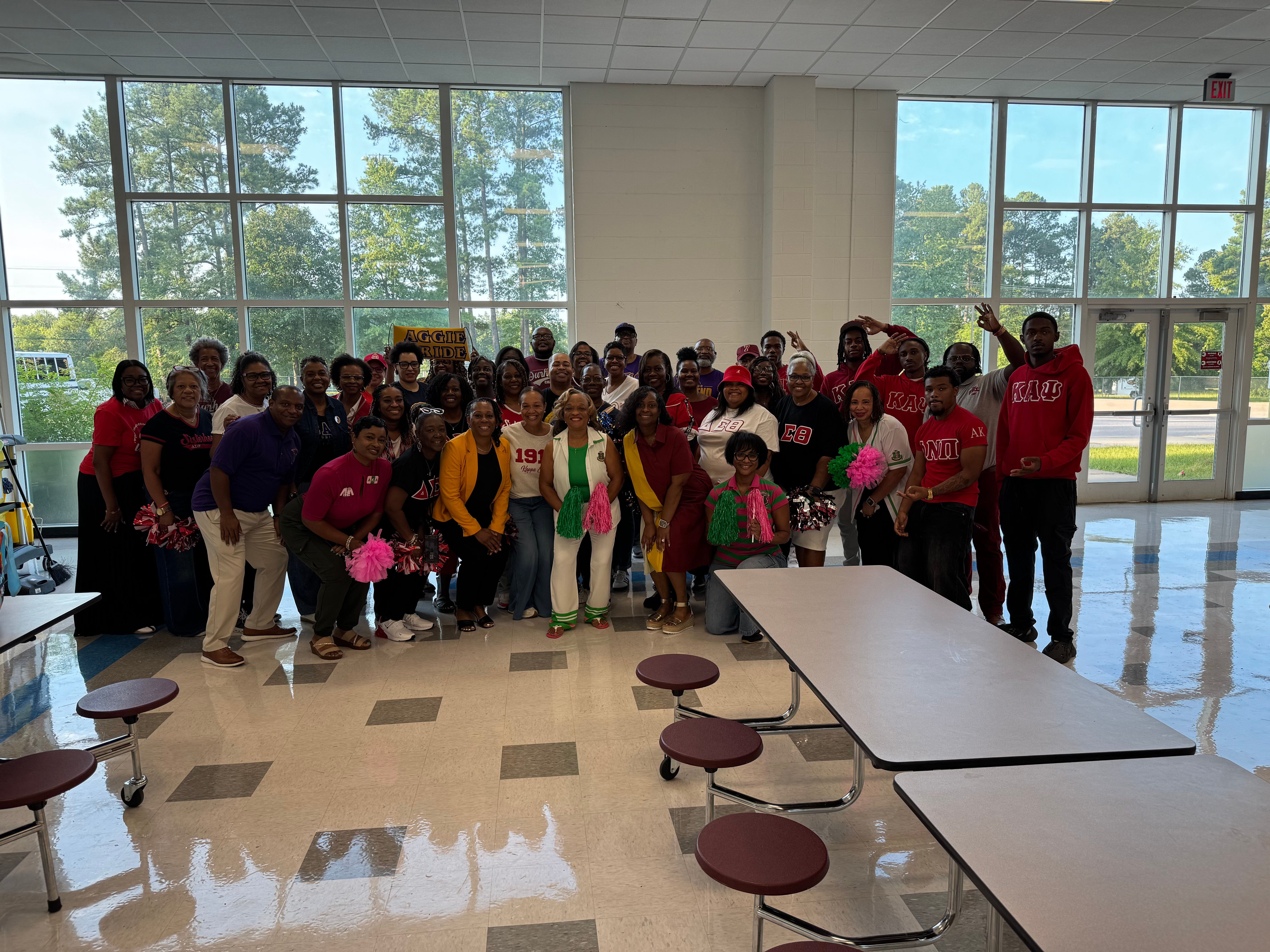 People in cafeteria gathered for clap-in on first day of school