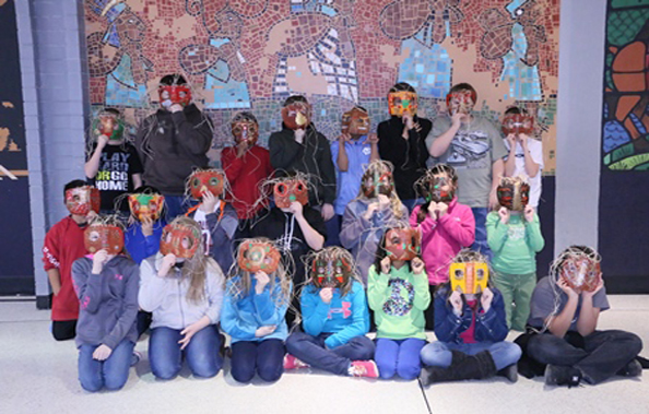 Kids covering their faces with masks