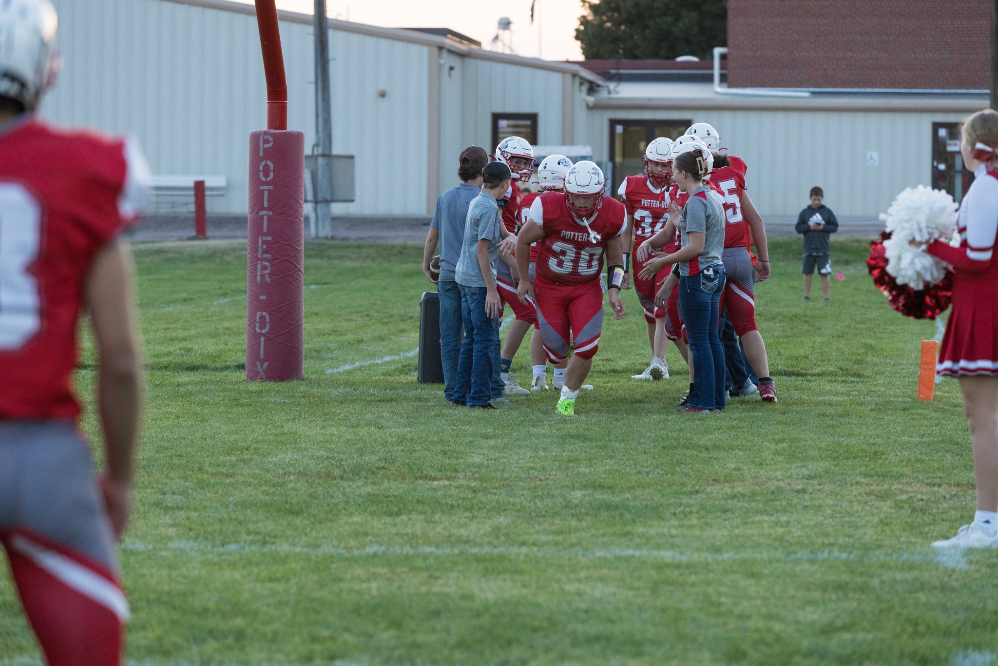 Football player entering football field