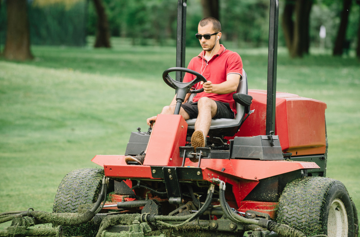 man mowing