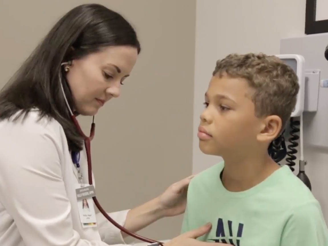 Photo of a doctor with a patient.