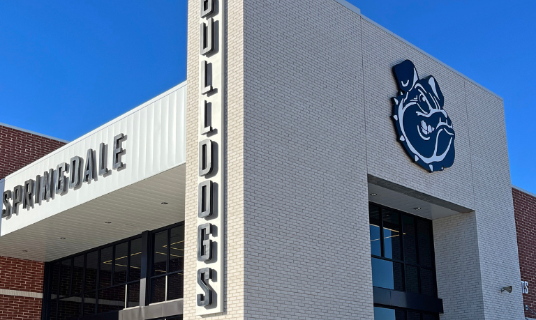 Another angle of the Springdale High School facade showing the Bulldogs sign.