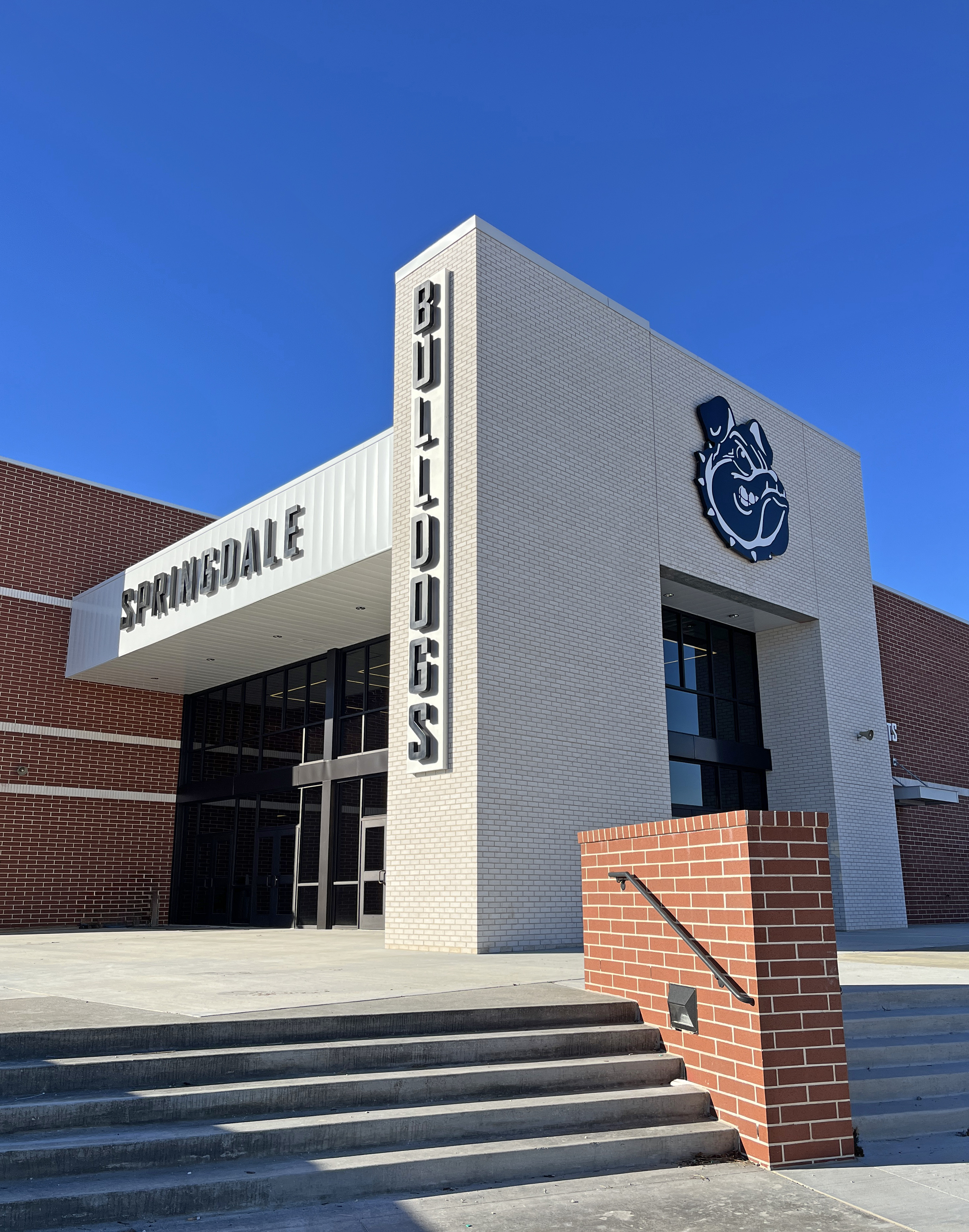 Wide shot of the entramce to Springdale High School.