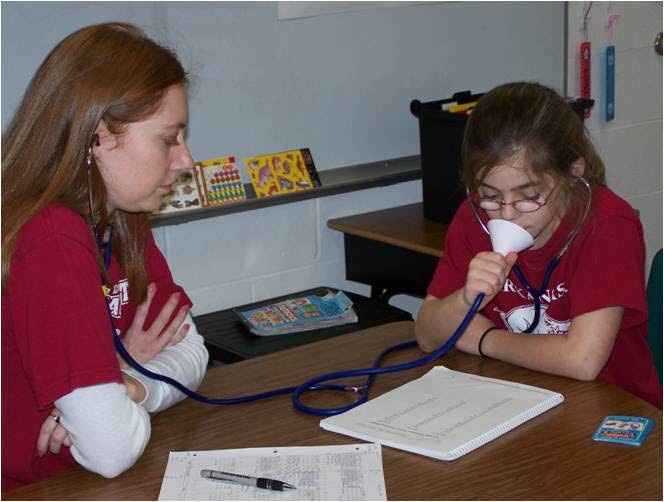 Photo of  a speech pathologist working with a student