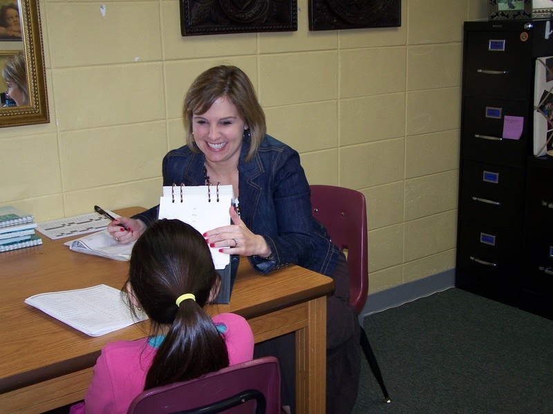 Photo of a school psychology specialist working with a student