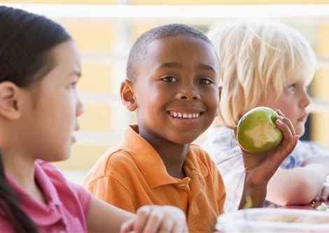 kid eating an apple