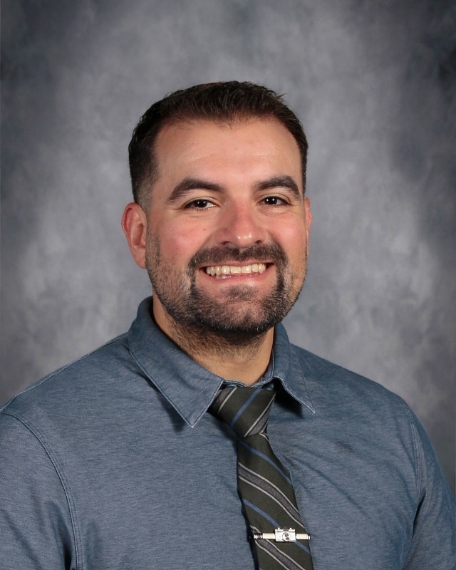 Coach Adam Shingler