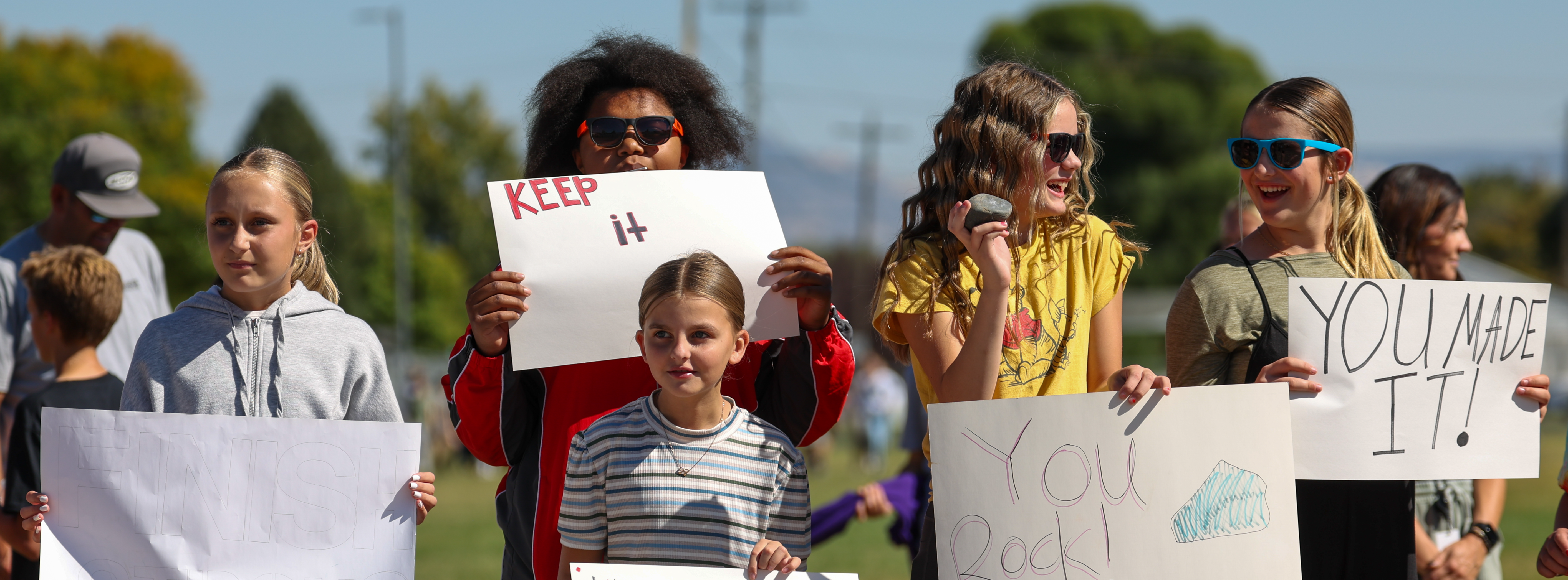 Students cheering on Hawkathon 2024 participants.