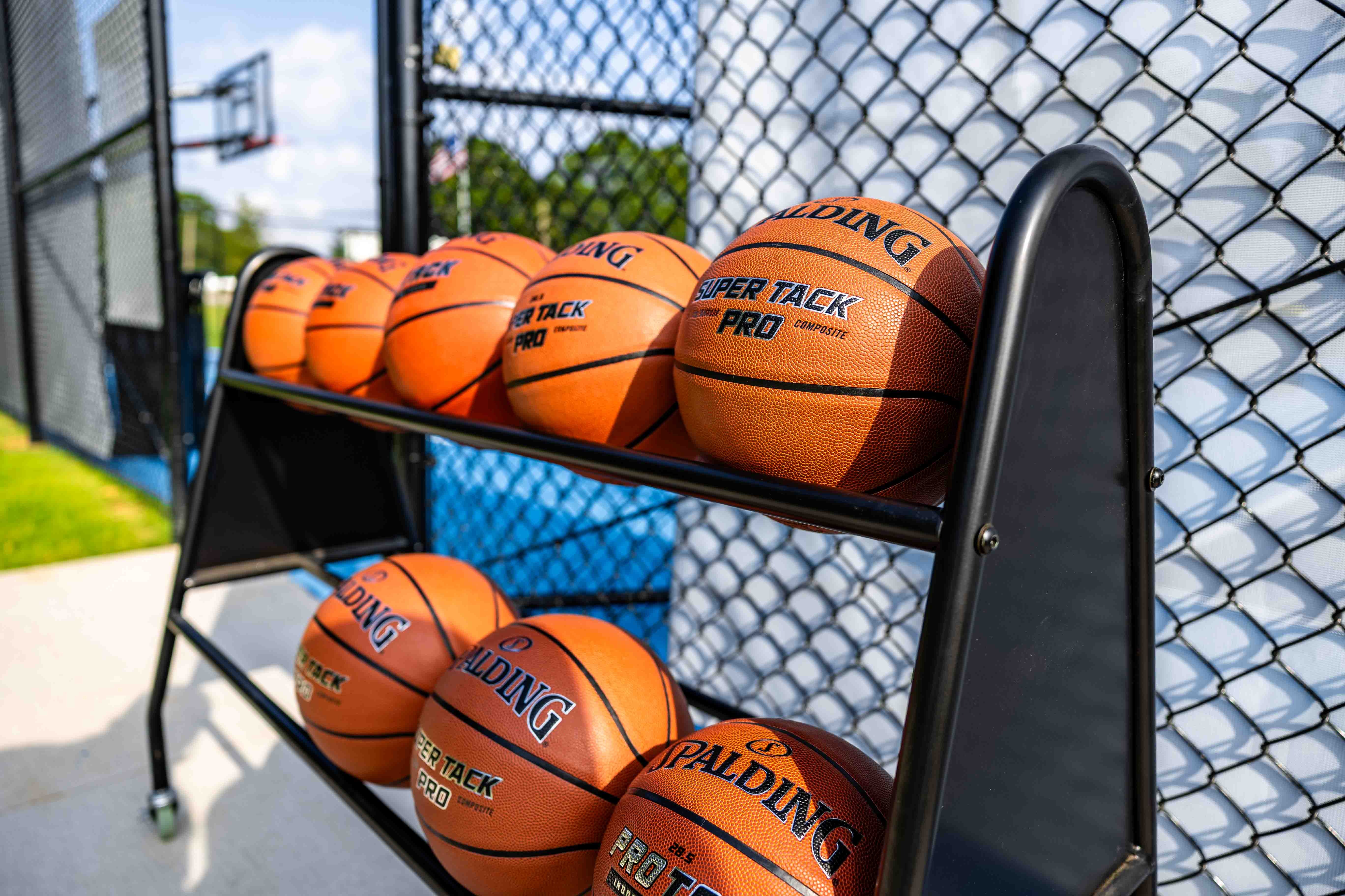 Basketballs on a cart
