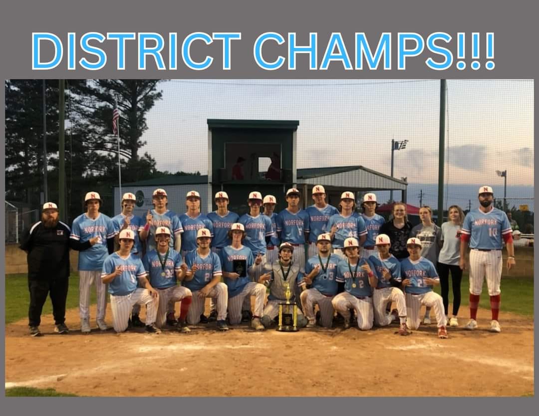 This is a photograph of a baseball team posing for a group photo with their trophies.