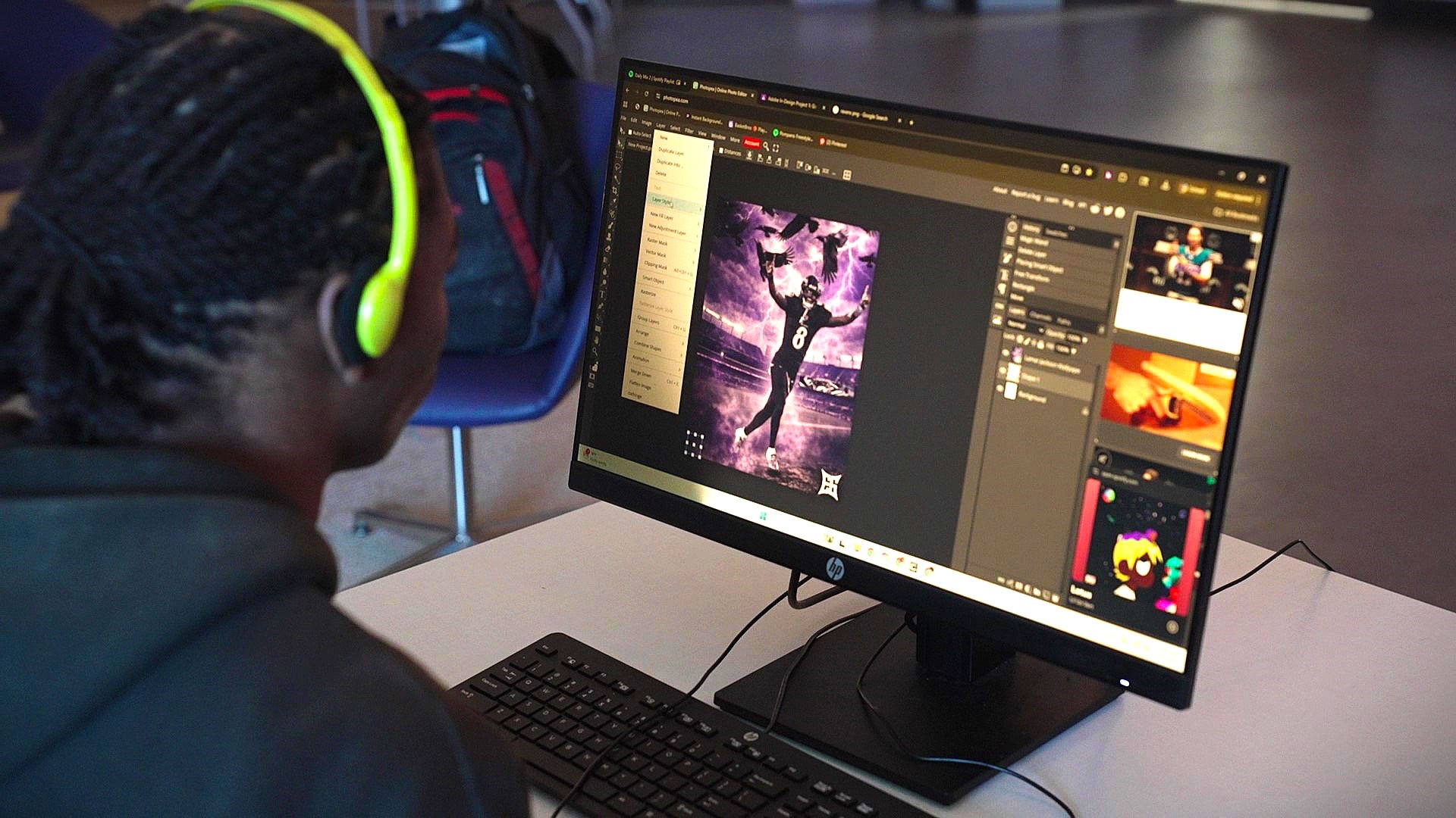 picture of graphic design student on the computer
