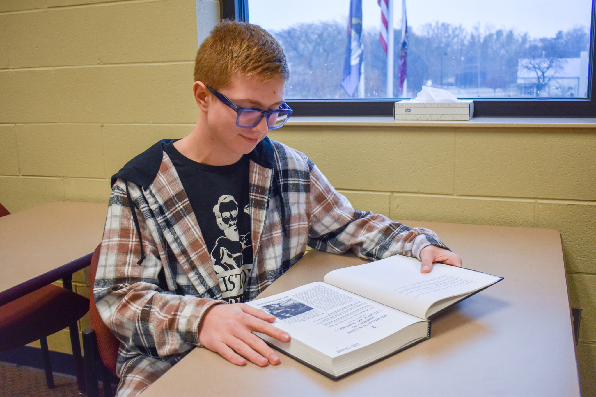 Student reading book