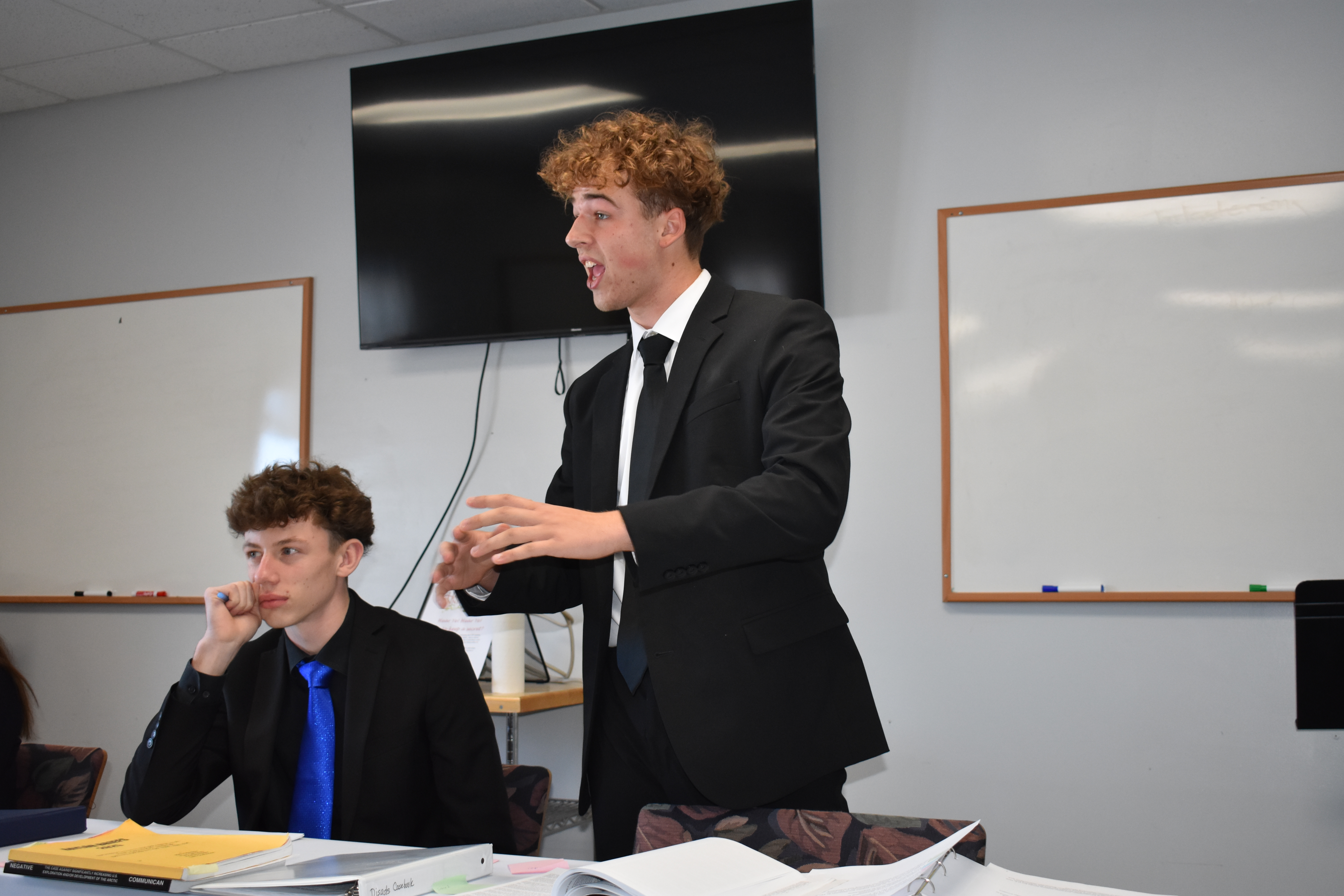 Debate student mid argument