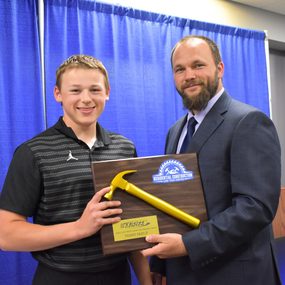 The gold hammer winner with the instructor