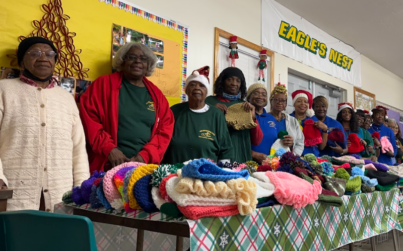 Local Seniors make 350 winter hats for students