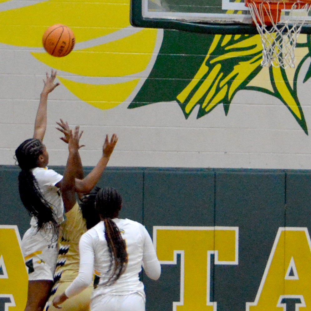 Kaliyah Herman shooting basketball