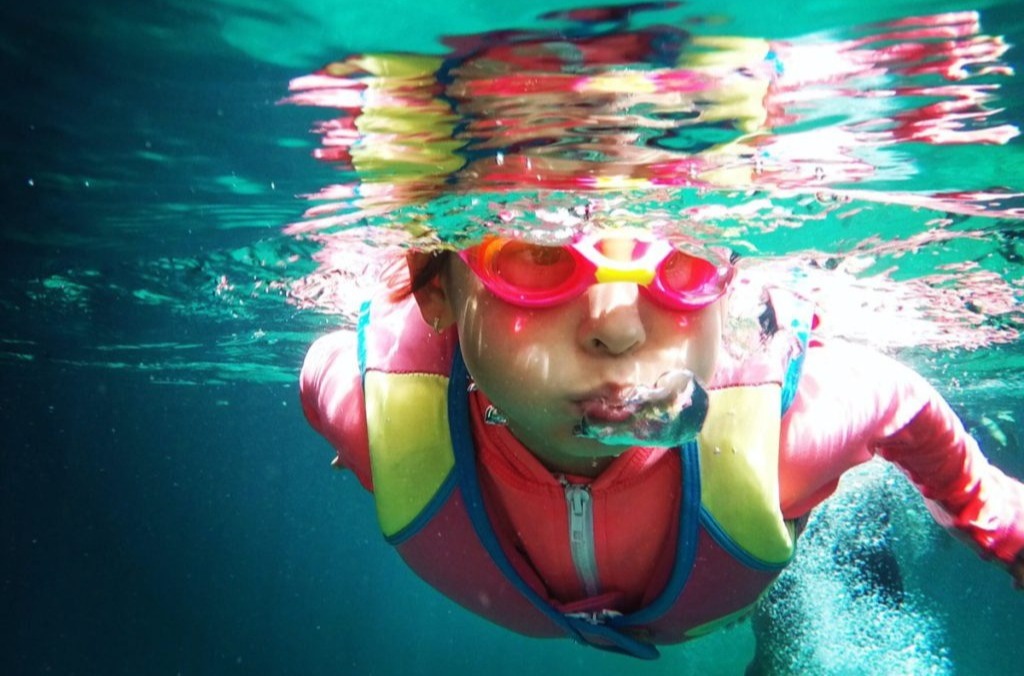Girl in swimming class