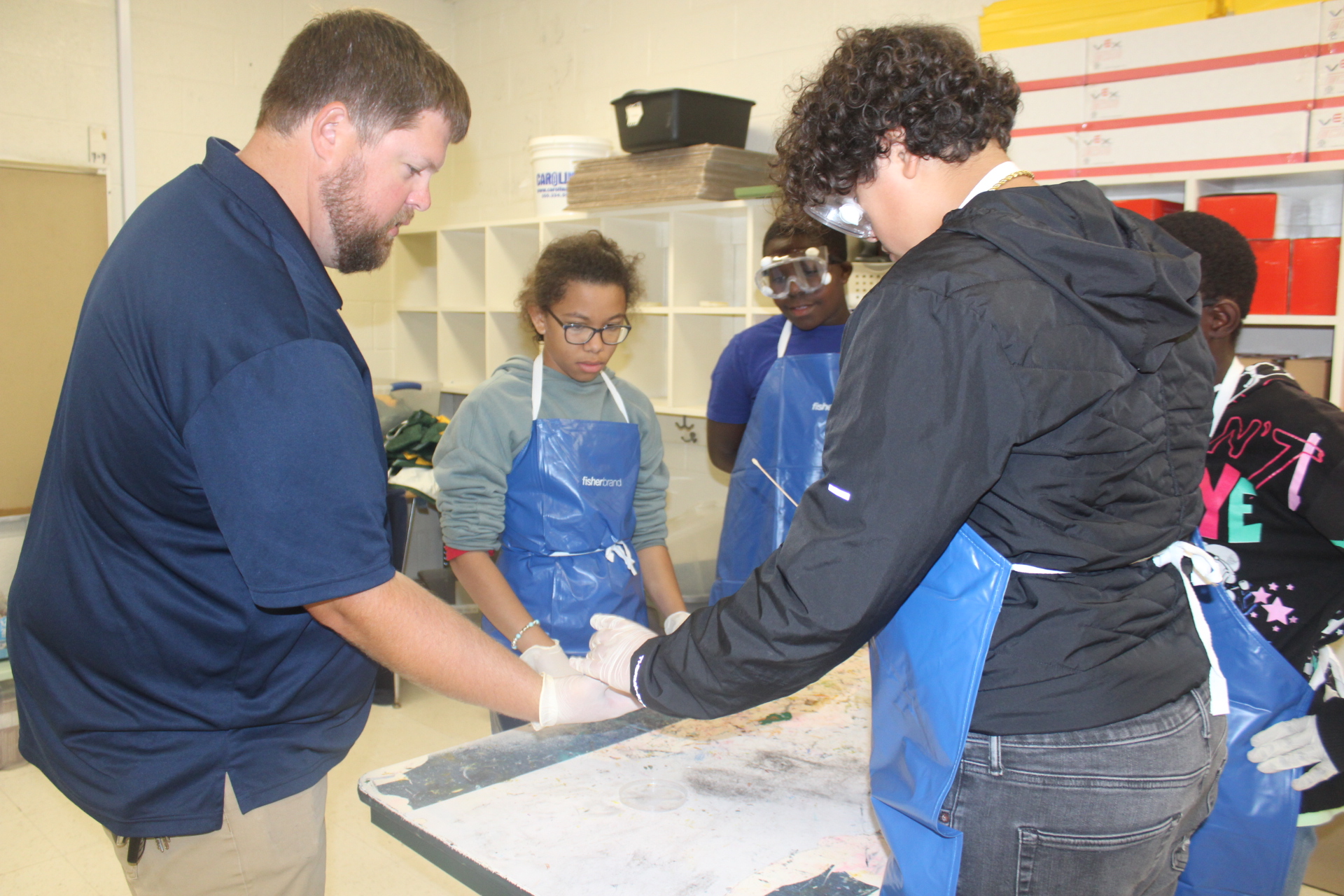 Mr. Hedgepeth and students completing sheep brain dissection activity