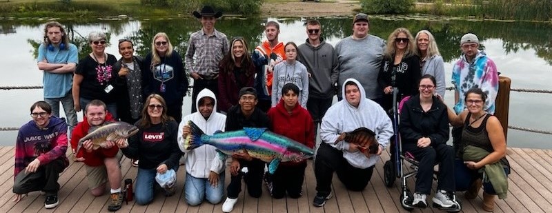 Students together fishing