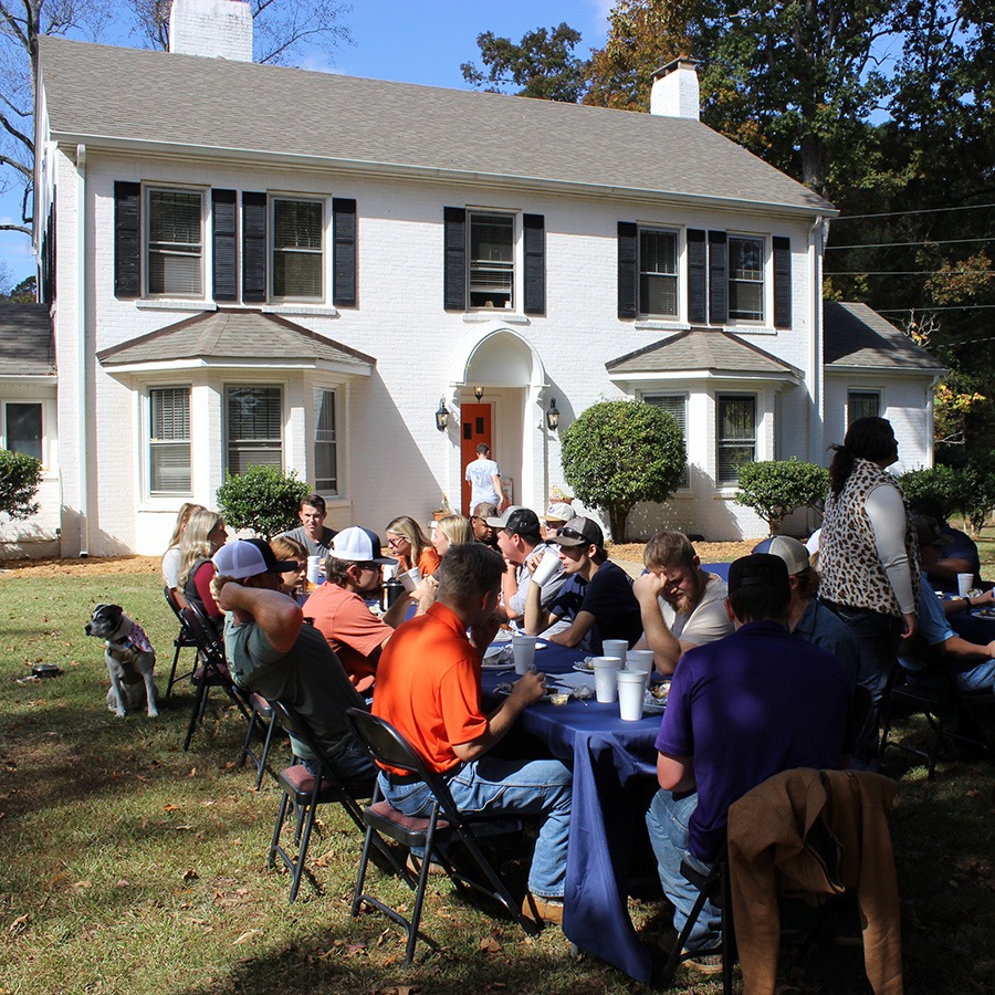 Our administration welcomes alumni to the President's House for a picnic.