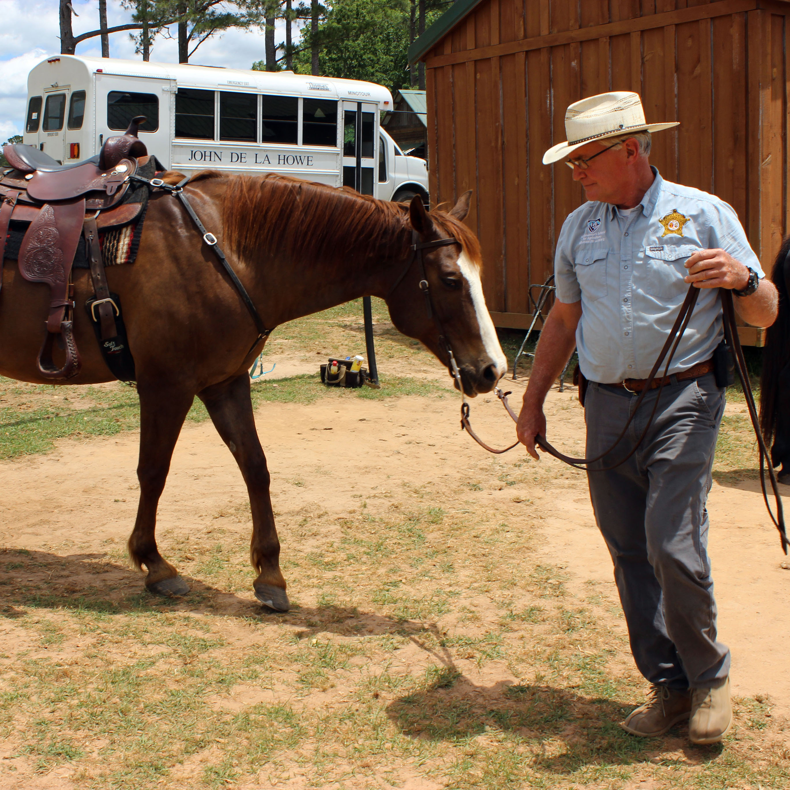 Even our resident School Resource Officer takes a hand in equine training.