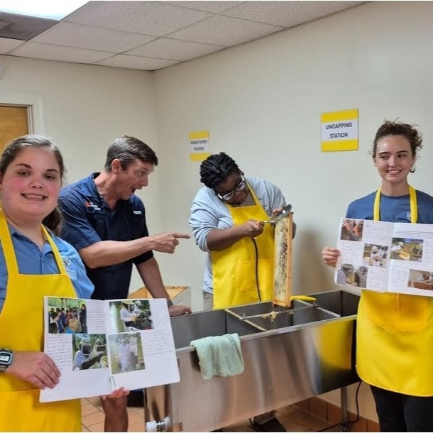 Our apiculture class begins to study one of the campus bee hives.