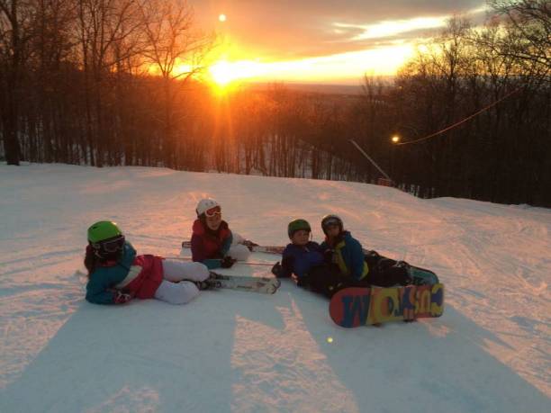 Ski Club members at sunset