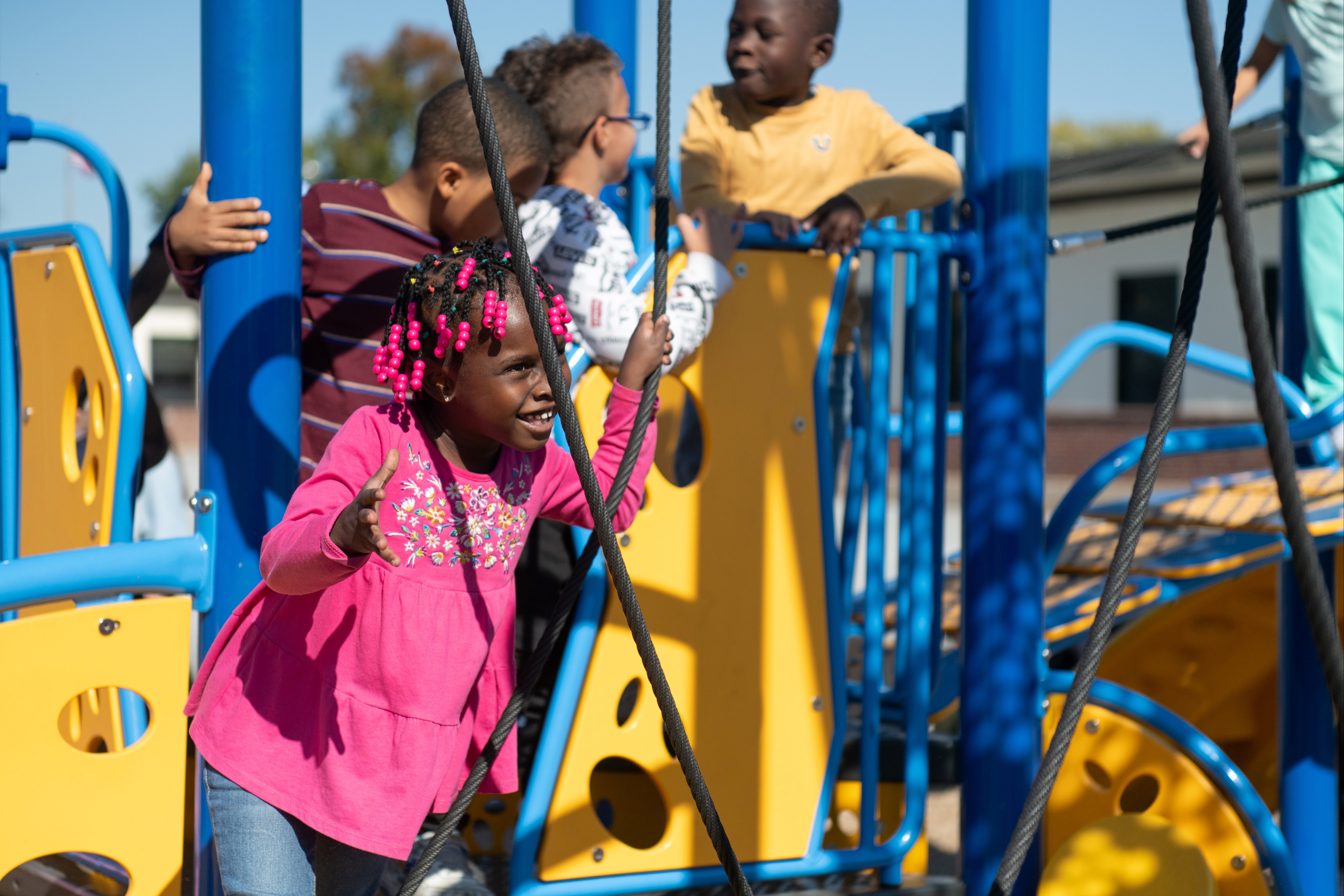 students on playground equipment