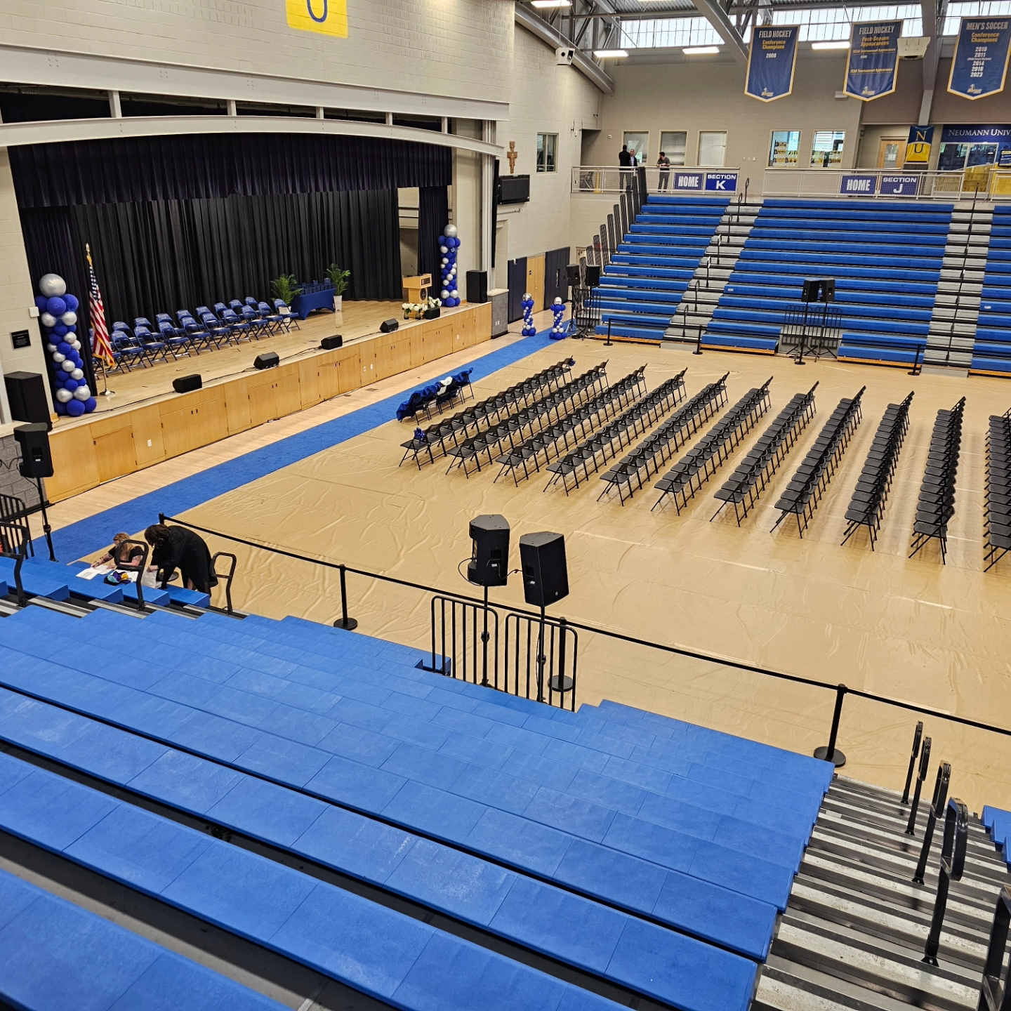 Seating set-up for student graduation at Neuman College