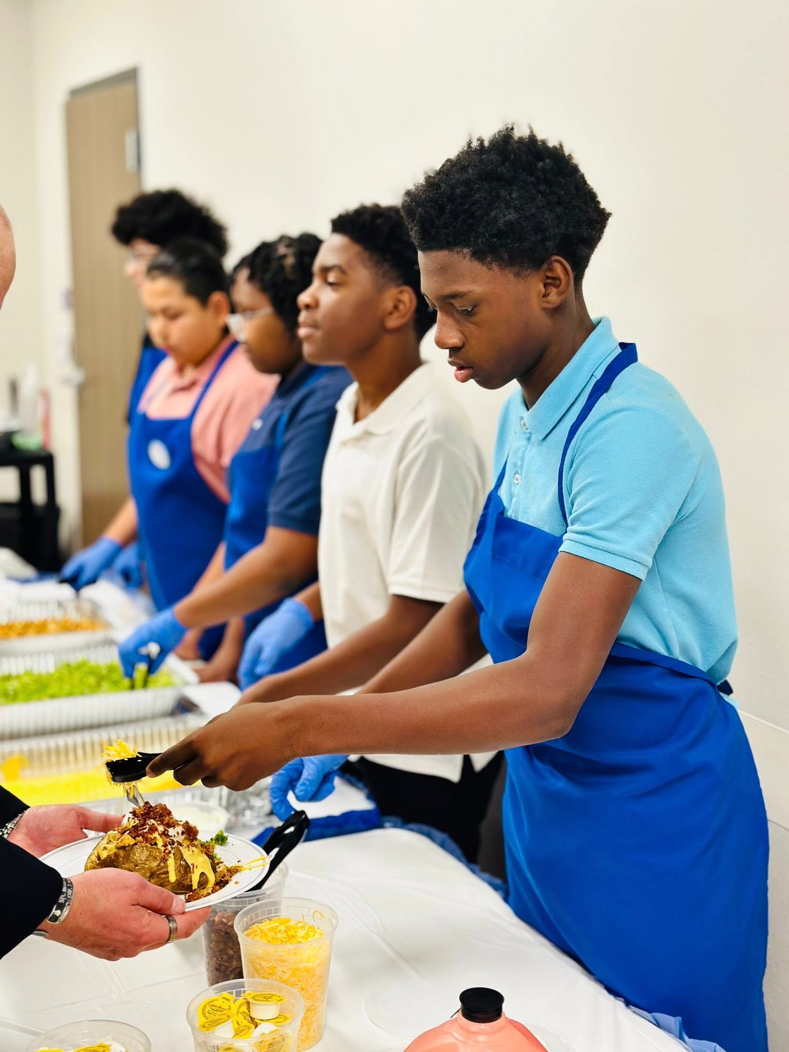 LMS Students Serving Food