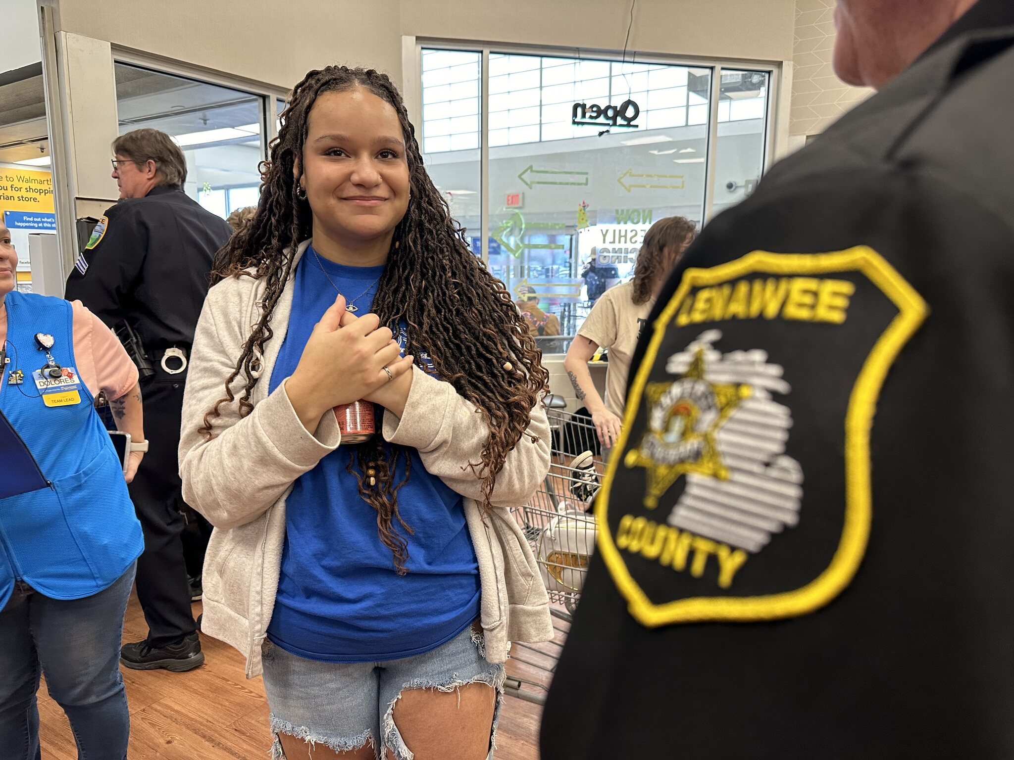 Student interacting with a law enforcement official.