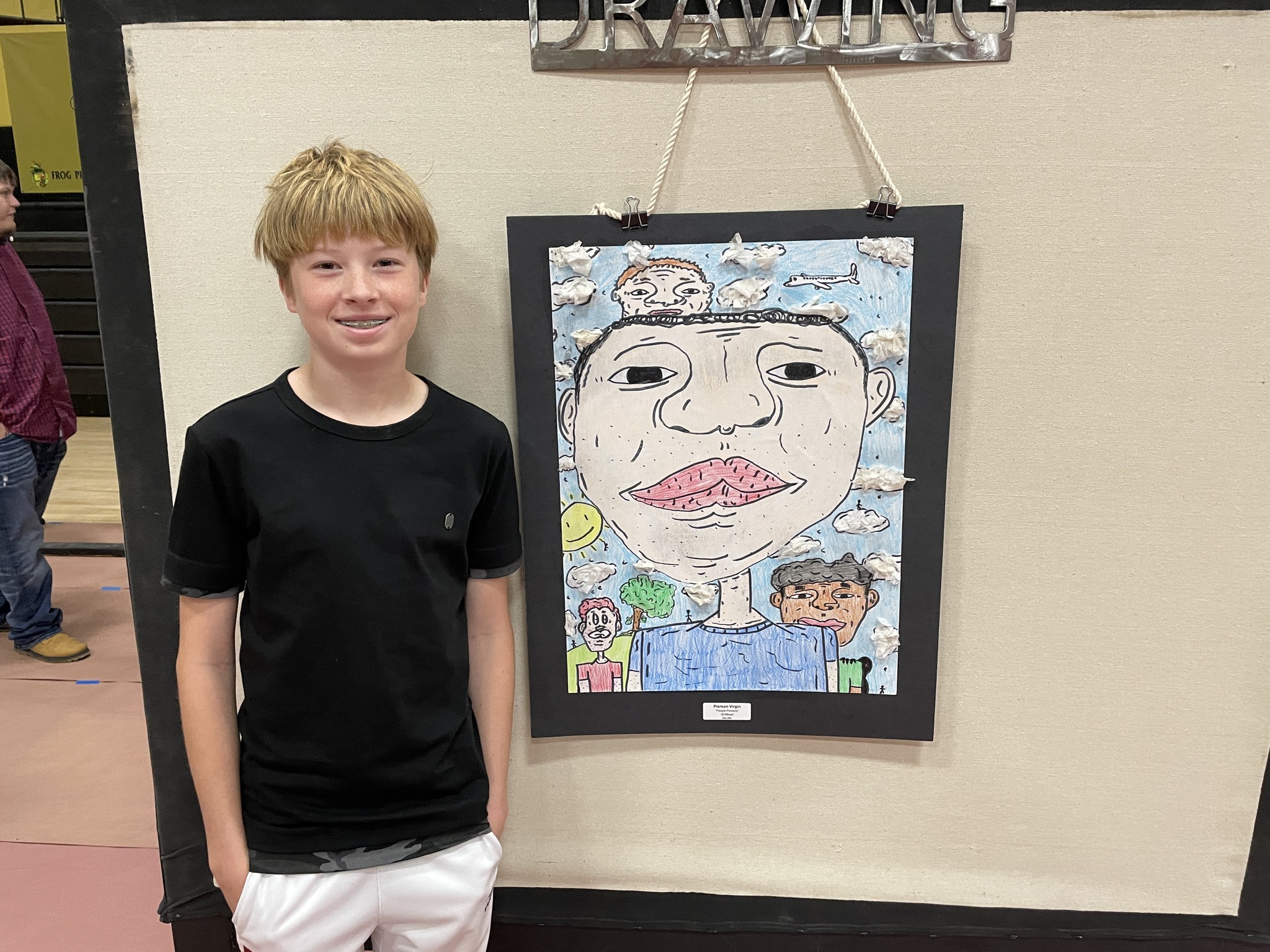 Art show participant with his entry