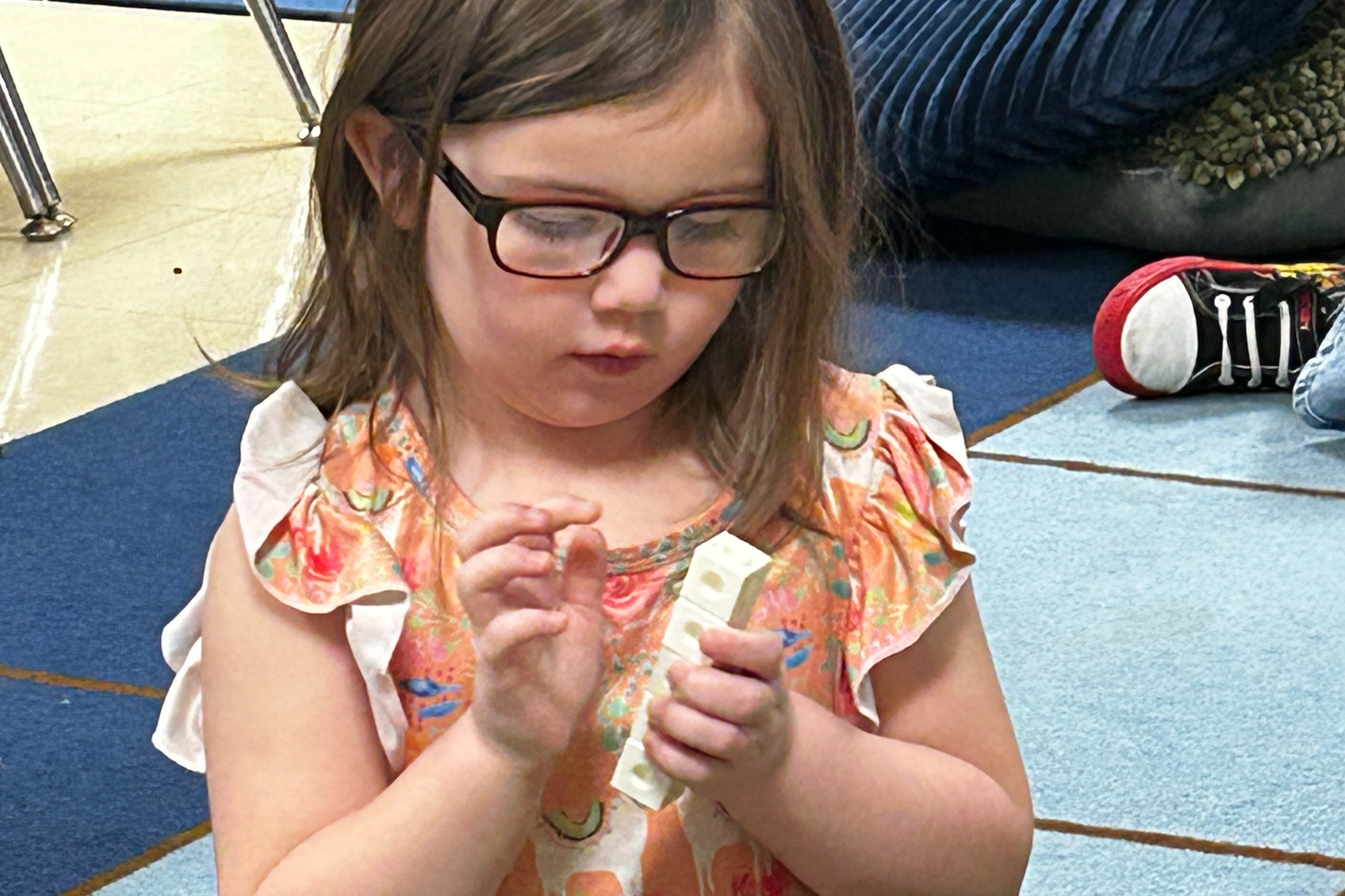 Child playing in a PreK classroom