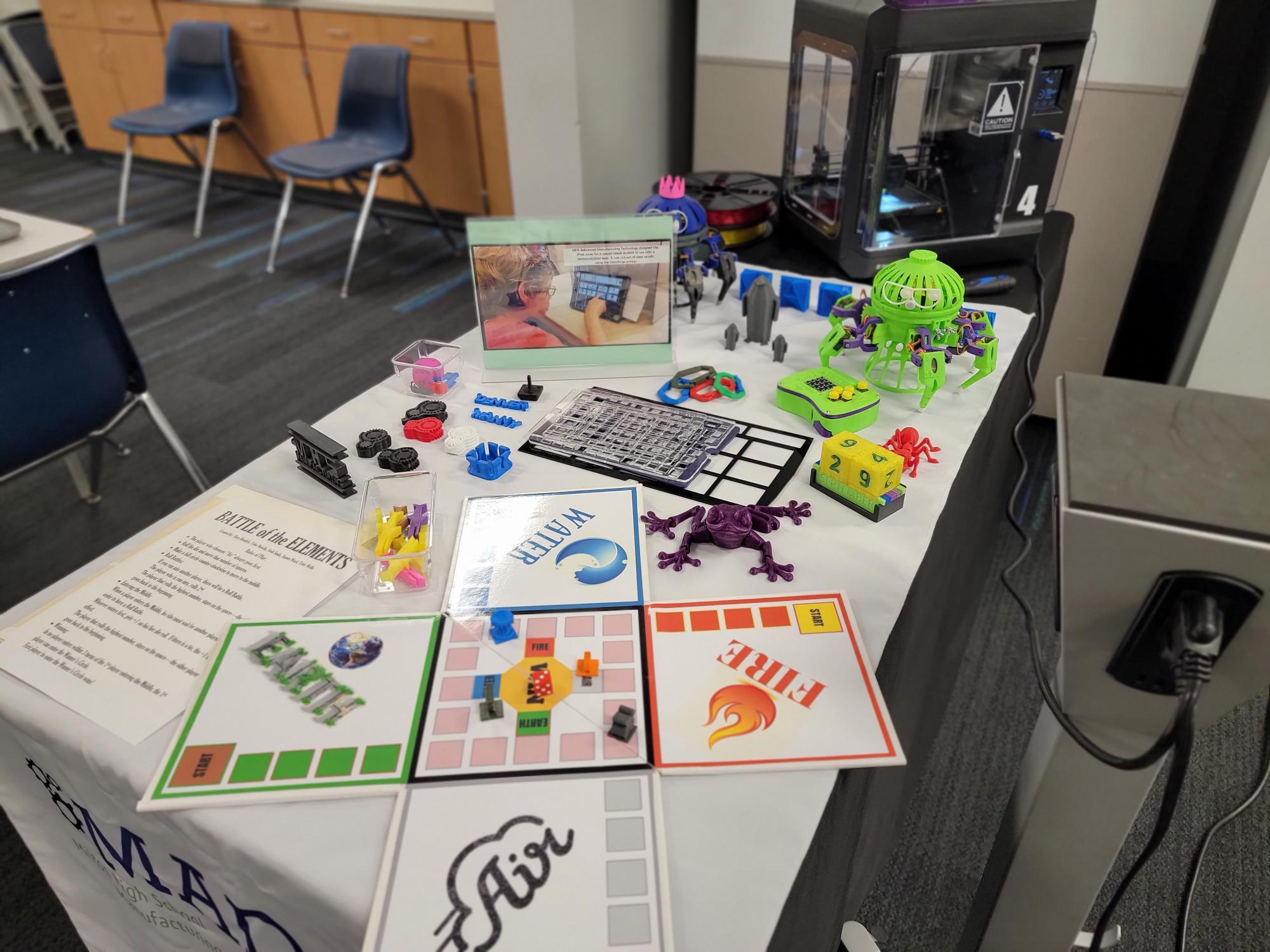 A table of colorful plastic toy sets.