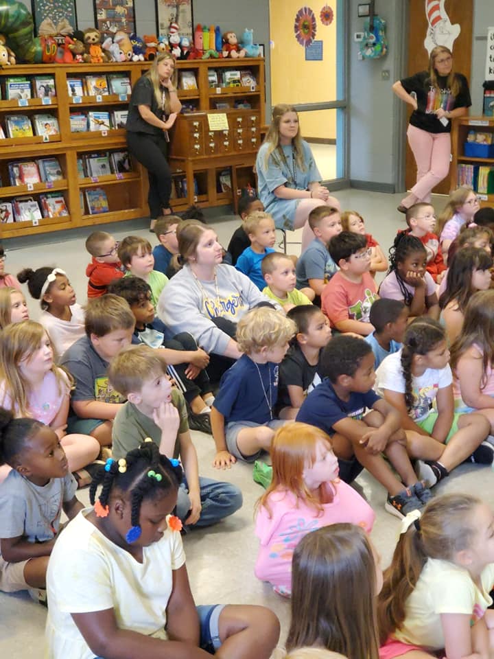 MPS students sitting and listening