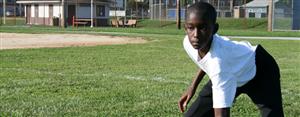 students practicing football