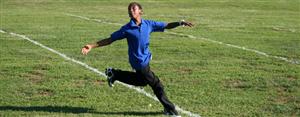 students practicing football